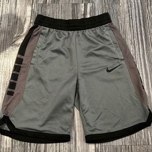 Grey and black Nike shorts.
